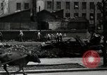 Standbild Japanische Bürger reißen Luftschutzbunker Tokio Japan Shiba Bezirk, 1945, aus Sekunde 41 historischem Filmmaterial Videoclip 65675025162