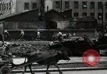 Standbild Japanische Bürger reißen Luftschutzbunker Tokio Japan Shiba Bezirk, 1945, aus Sekunde 42 historischem Filmmaterial Videoclip 65675025162