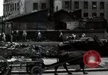 Standbild Japanische Bürger reißen Luftschutzbunker Tokio Japan Shiba Bezirk, 1945, aus Sekunde 43 historischem Filmmaterial Videoclip 65675025162