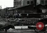 Standbild Japanische Bürger reißen Luftschutzbunker Tokio Japan Shiba Bezirk, 1945, aus Sekunde 46 historischem Filmmaterial Videoclip 65675025162