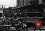 Standbild Japanische Bürger reißen Luftschutzbunker Tokio Japan Shiba Bezirk, 1945, aus Sekunde 49 historischem Filmmaterial Videoclip 65675025162