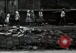 Standbild Japanische Bürger reißen Luftschutzbunker Tokio Japan Shiba Bezirk, 1945, aus Sekunde 59 historischem Filmmaterial Videoclip 65675025162