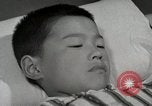 Image of CARE Report from Japan Japan, 1950, second 34 stock footage video 65675025210