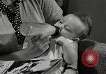 Immagine di Le persone hanno contribuito a cura di Self-help project New York United States USA, 1950, secondo 10 filmato di repertorio 65675025217