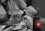 Immagine di Le persone hanno contribuito a cura di Self-help project New York United States USA, 1950, secondo 11 filmato di repertorio 65675025217