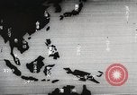 Immagine di Paracadute giapponese di truppe e materiali di consumo vengono ignorati Celebes, 1942, secondo 9 filmato di repertorio 65675025225