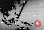 Immagine di Paracadute giapponese di truppe e materiali di consumo vengono ignorati Celebes, 1942, secondo 12 filmato di repertorio 65675025225