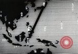 Immagine di Paracadute giapponese di truppe e materiali di consumo vengono ignorati Celebes, 1942, secondo 13 filmato di repertorio 65675025225
