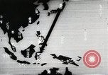 Immagine di Paracadute giapponese di truppe e materiali di consumo vengono ignorati Celebes, 1942, secondo 15 filmato di repertorio 65675025225