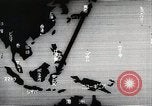 Immagine di Paracadute giapponese di truppe e materiali di consumo vengono ignorati Celebes, 1942, secondo 17 filmato di repertorio 65675025225