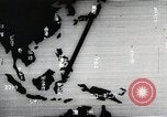Immagine di Paracadute giapponese di truppe e materiali di consumo vengono ignorati Celebes, 1942, secondo 19 filmato di repertorio 65675025225
