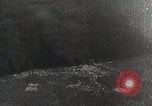 Immagine di Paracadute giapponese di truppe e materiali di consumo vengono ignorati Celebes, 1942, secondo 35 filmato di repertorio 65675025225