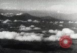 Immagine di Paracadute giapponese di truppe e materiali di consumo vengono ignorati Celebes, 1942, secondo 46 filmato di repertorio 65675025225
