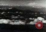 Immagine di Paracadute giapponese di truppe e materiali di consumo vengono ignorati Celebes, 1942, secondo 49 filmato di repertorio 65675025225