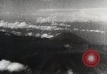 Immagine di Paracadute giapponese di truppe e materiali di consumo vengono ignorati Celebes, 1942, secondo 54 filmato di repertorio 65675025225