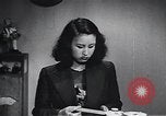 Standbild Professionelle Arbeitsplätze moderner japanischer Frauen Japan, 1950, aus Sekunde 23 historischem Filmmaterial Videoclip 65675025239
