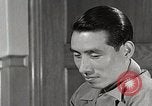 Standbild japanische Studentin joins außerschulische Aktivitäten Bloomington Indiana USA, 1951, aus Sekunde 18 historischem Filmmaterial Videoclip 65675025244