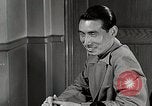 Standbild japanische Studentin joins außerschulische Aktivitäten Bloomington Indiana USA, 1951, aus Sekunde 25 historischem Filmmaterial Videoclip 65675025244