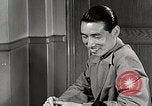 Standbild japanische Studentin joins außerschulische Aktivitäten Bloomington Indiana USA, 1951, aus Sekunde 27 historischem Filmmaterial Videoclip 65675025244