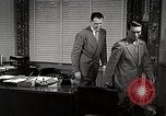 Standbild japanische Studentin joins außerschulische Aktivitäten Bloomington Indiana USA, 1951, aus Sekunde 32 historischem Filmmaterial Videoclip 65675025244