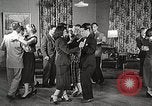 Standbild japanische Studentin joins außerschulische Aktivitäten Bloomington Indiana USA, 1951, aus Sekunde 54 historischem Filmmaterial Videoclip 65675025244