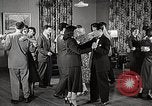 Standbild japanische Studentin joins außerschulische Aktivitäten Bloomington Indiana USA, 1951, aus Sekunde 55 historischem Filmmaterial Videoclip 65675025244