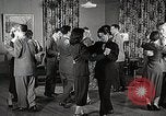 Standbild japanische Studentin joins außerschulische Aktivitäten Bloomington Indiana USA, 1951, aus Sekunde 56 historischem Filmmaterial Videoclip 65675025244