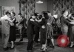 Standbild japanische Studentin joins außerschulische Aktivitäten Bloomington Indiana USA, 1951, aus Sekunde 62 historischem Filmmaterial Videoclip 65675025244