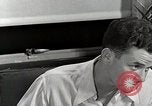 Standbild japanische Studentin mit seinem amerikanischen Mitbewohner Bloomington Indiana USA, 1951, aus Sekunde 34 historischem Filmmaterial Videoclip 65675025245