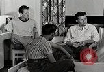 Standbild japanische Studentin mit seinem amerikanischen Mitbewohner Bloomington Indiana USA, 1951, aus Sekunde 62 historischem Filmmaterial Videoclip 65675025245