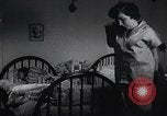 Immagine di American Donne al lavoro in fabbrica New York United States USA, 1950, secondo 38 filmato di repertorio 65675025249