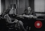 Immagine di Donna americana lavora come segretaria personale New York United States USA, 1950, secondo 7 filmato di repertorio 65675025250