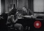 Immagine di Donna americana lavora come segretaria personale New York United States USA, 1950, secondo 17 filmato di repertorio 65675025250