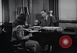 Immagine di Donna americana lavora come segretaria personale New York United States USA, 1950, secondo 18 filmato di repertorio 65675025250
