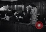 Immagine di Donna americana lavora come segretaria personale New York United States USA, 1950, secondo 30 filmato di repertorio 65675025250