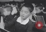 Standbild japanische Kinder in der Schule Japan, 1941, aus Sekunde 46 historischem Filmmaterial Videoclip 65675025253