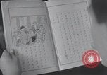 Standbild japanische Kinder in der Schule Japan, 1941, aus Sekunde 49 historischem Filmmaterial Videoclip 65675025253