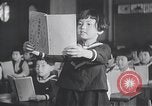 Standbild japanische Kinder in der Schule Japan, 1941, aus Sekunde 60 historischem Filmmaterial Videoclip 65675025253