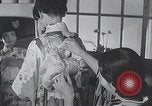 Image of Family makes an excursion to cherry blossom festival Japan, 1941, second 3 stock footage video 65675025255