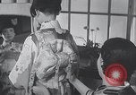 Image of Family makes an excursion to cherry blossom festival Japan, 1941, second 6 stock footage video 65675025255
