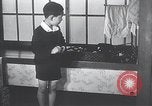 Image of Family makes an excursion to cherry blossom festival Japan, 1941, second 10 stock footage video 65675025255