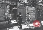 Image of Family makes an excursion to cherry blossom festival Japan, 1941, second 15 stock footage video 65675025255