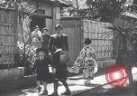 Image of Family makes an excursion to cherry blossom festival Japan, 1941, second 16 stock footage video 65675025255