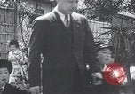 Image of Family makes an excursion to cherry blossom festival Japan, 1941, second 21 stock footage video 65675025255