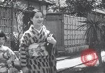 Image of Family makes an excursion to cherry blossom festival Japan, 1941, second 23 stock footage video 65675025255