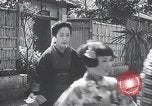 Image of Family makes an excursion to cherry blossom festival Japan, 1941, second 24 stock footage video 65675025255