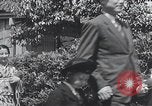 Image of Family makes an excursion to cherry blossom festival Japan, 1941, second 26 stock footage video 65675025255