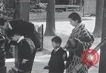 Image of Family makes an excursion to cherry blossom festival Japan, 1941, second 59 stock footage video 65675025255