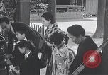 Image of Family makes an excursion to cherry blossom festival Japan, 1941, second 61 stock footage video 65675025255