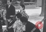 Image of Family makes an excursion to cherry blossom festival Japan, 1941, second 62 stock footage video 65675025255